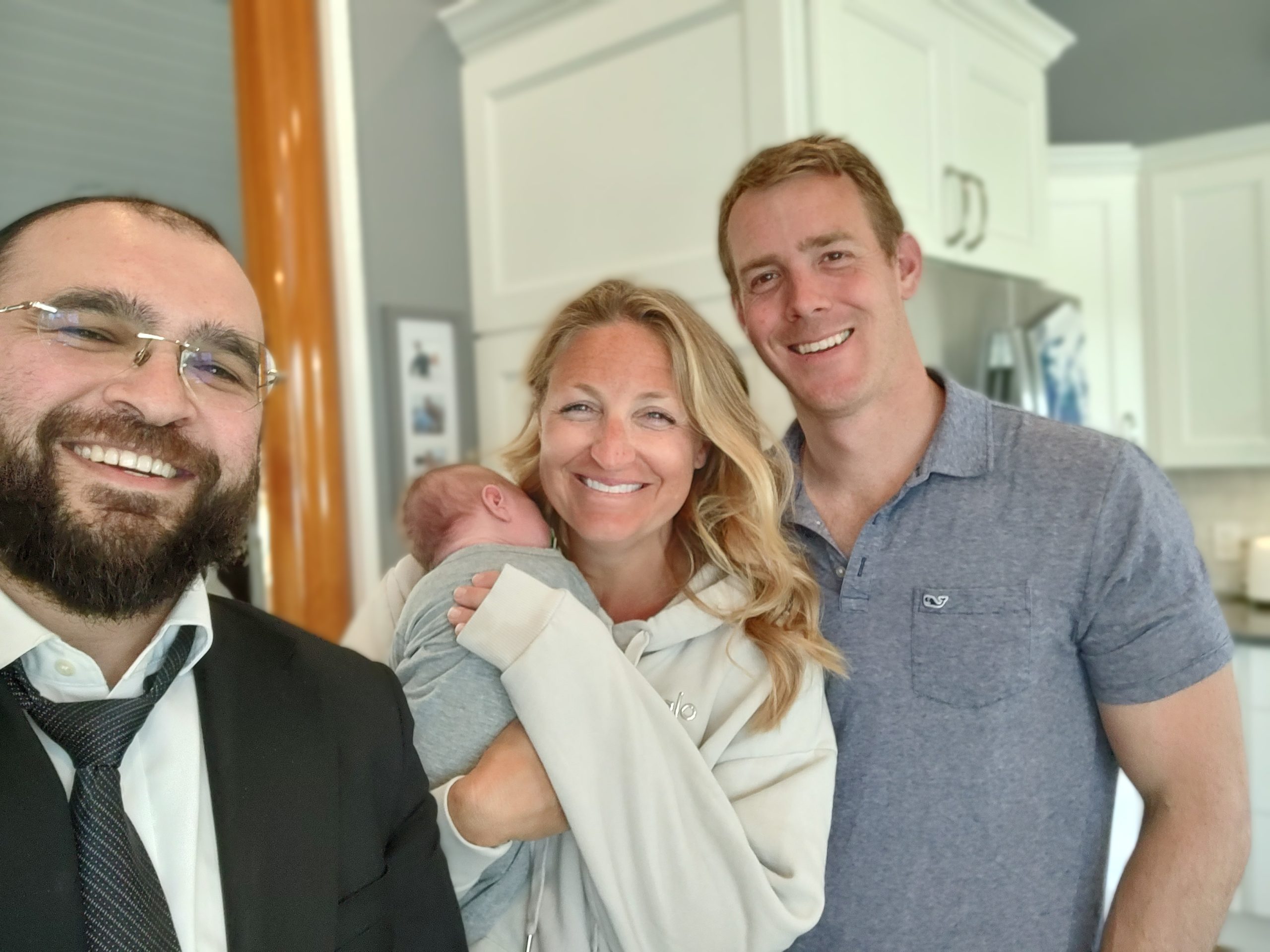Family and baby photo for newborn circumcision care