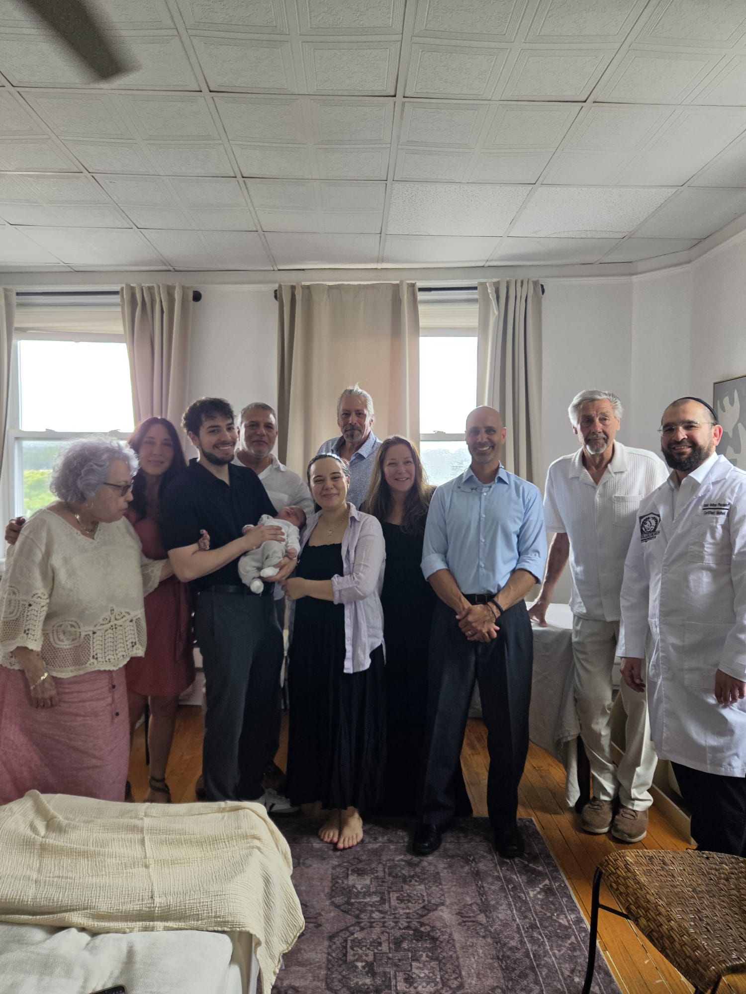Family and baby photo for infant circumcision care