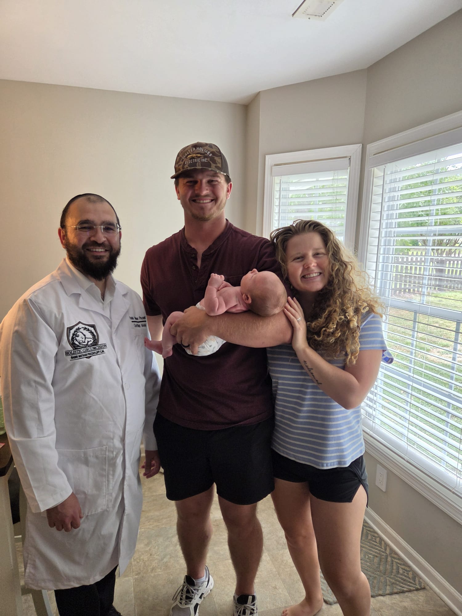 Family and baby photo for newborn circumcision care