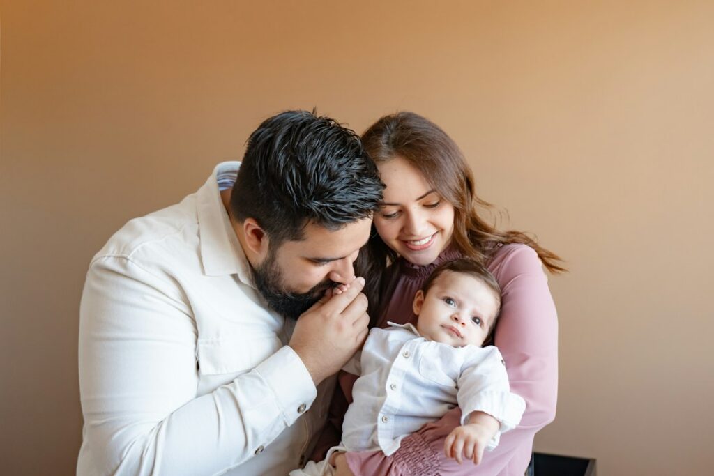 New parents together with their baby