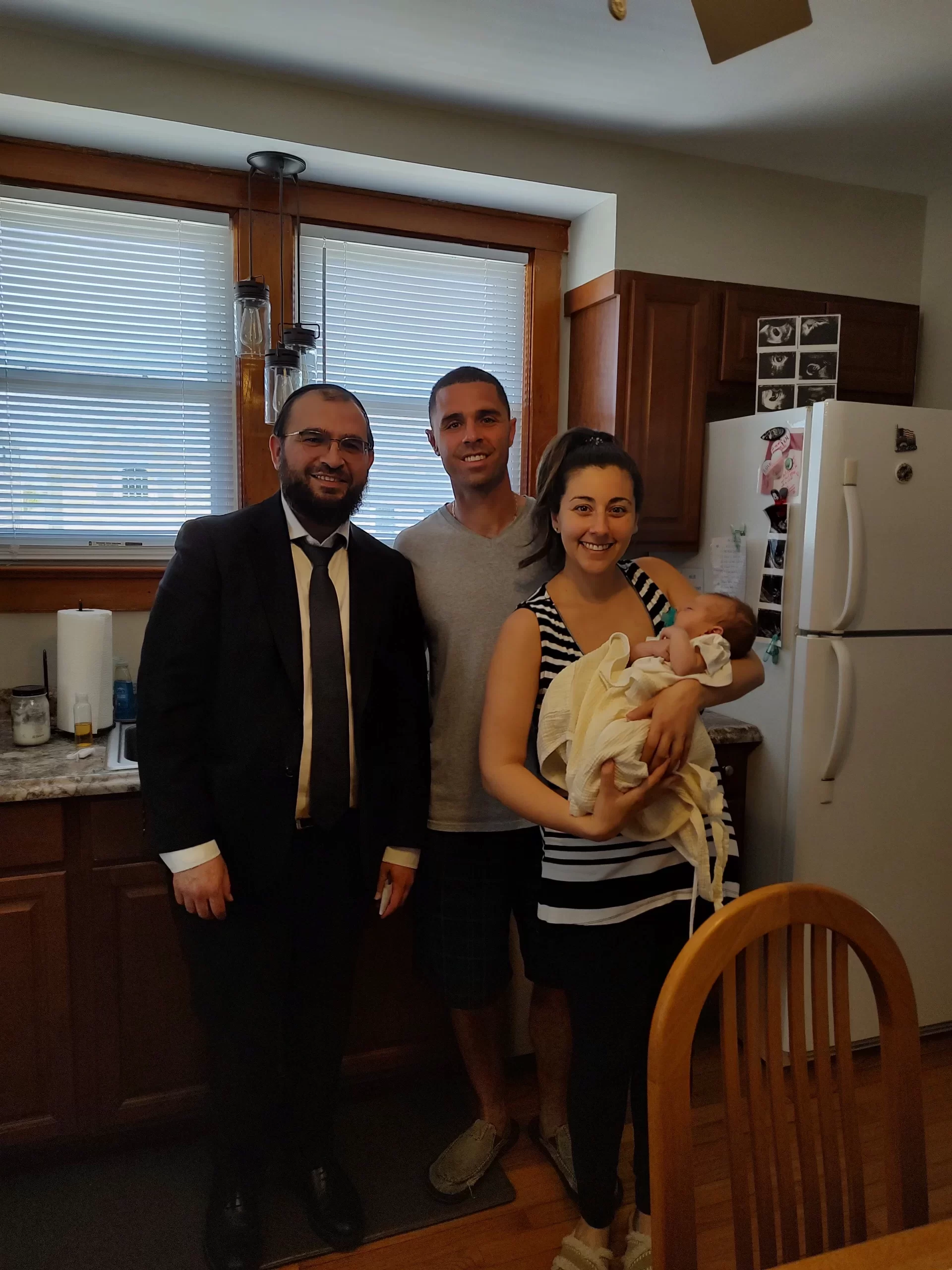 Parents and baby with their circumcision provider
