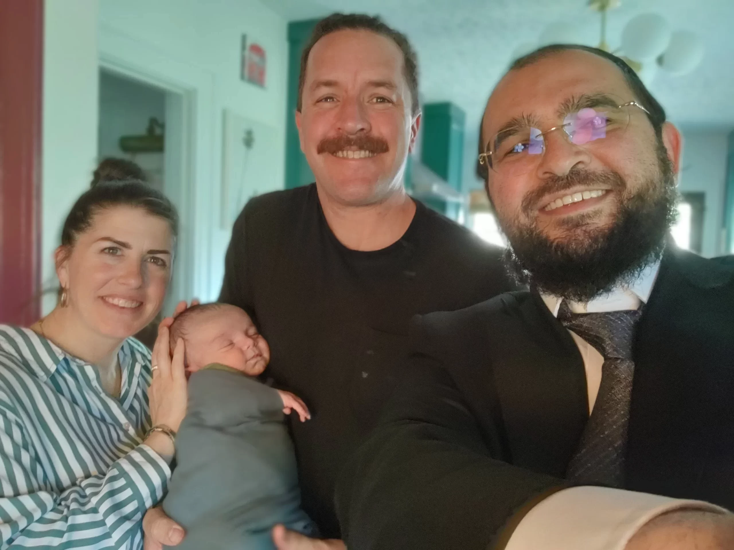 Family celebrating a special circumcision occasion