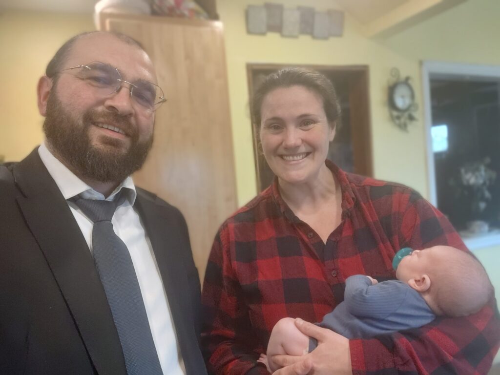 Holistic Circumcision family and community photo in Newton