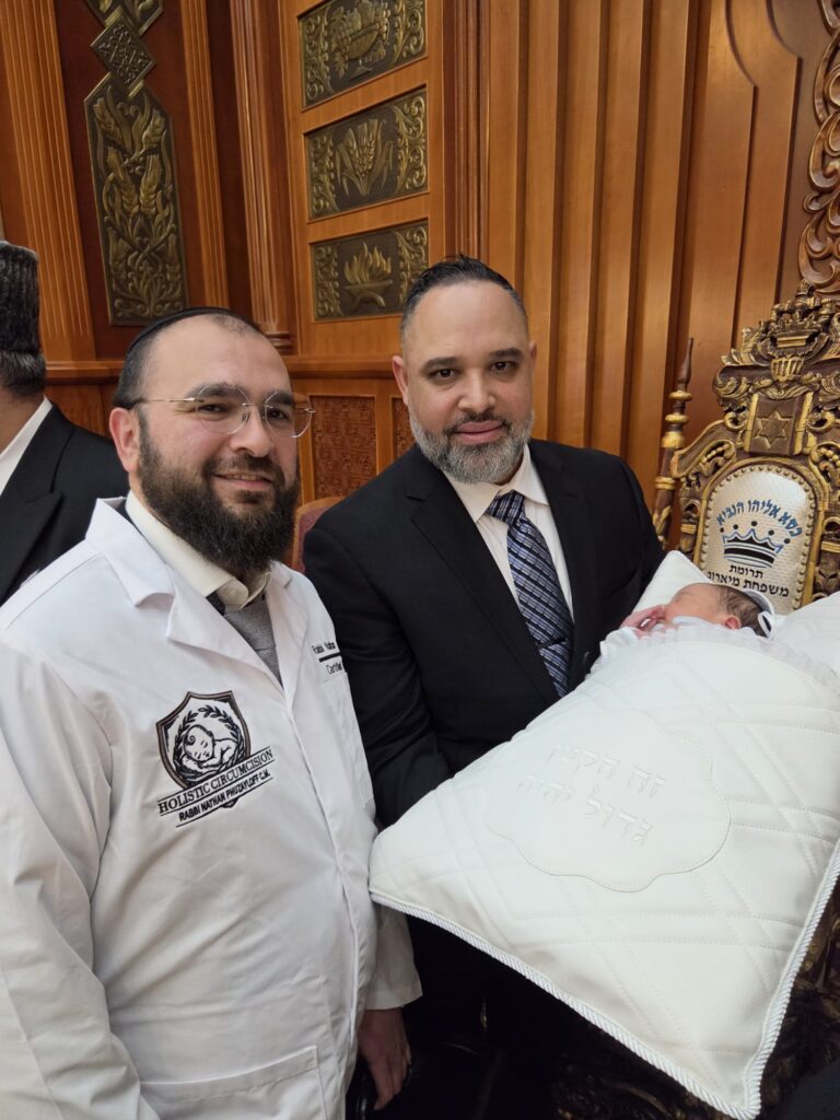 Holistic Circumcision family and community photo in Queens, New York
